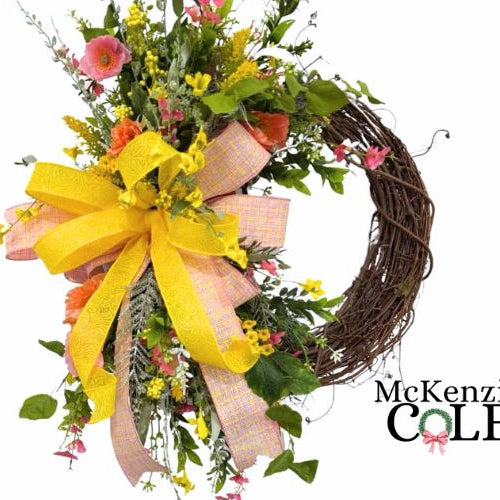 spring florals added to a grapevine wreath