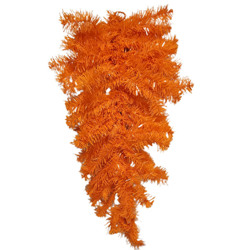 The 24 Halloween Teardrop Orange 82298-OR hangs upside down on a gray wall, featuring bright orange artificial pine branches and a small white tag, creating a striking Halloween decoration.