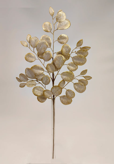 The 29 Gold Eucalyptus Leaf Spray 32140 features round, gold and silver metallic leaves on slender stems with textured, glittery foliage—perfect for eye-catching decor against any plain background.