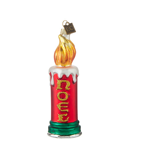 The EC 5.5" Noel Candle Ornament (4253146) features red and green glass, a gold flame, white wax drips, "Noel" in gold glitter vertically, a top charm, and comes with a gift box for easy gifting.
