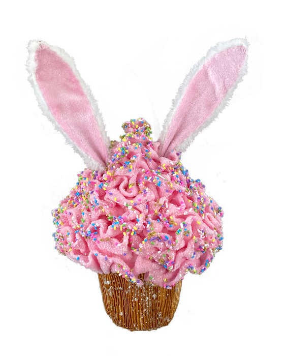 The 8 by 16 Pink Bunny Ear Cupcake Ornament 63300PK features a cupcake with pink frosting, colorful sprinkles, and playful fabric bunny ears, making it perfect for any festive occasion.