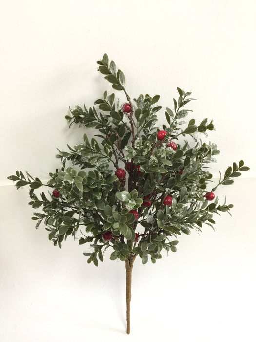 The 21 Red and Green Iced Boxwood Berry Spray 65382 features green leaves, red berries, and artificial snow, set against a plain white background.
