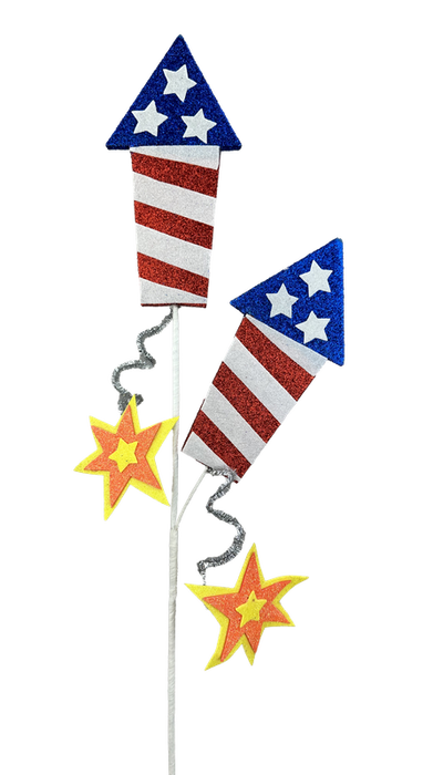 The 26 Red White and Blue Glitter Rocket Spray with 2 Stems features two rocket shapes in American flag designs attached to sticks, along with yellow and red glitter star decorations for a festive look.