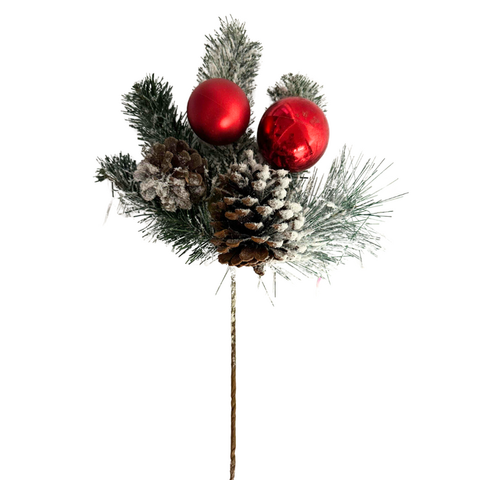The 15 In Pinecone Ball Pick 84718 features frosted pine needles, two red balls, and flocked pinecones on a brown stem, displayed against a white background.