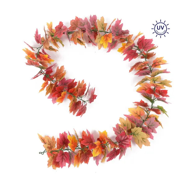 The Maple Leaf Garland UV Protected 5.25 E6224988 displays vibrant orange, brown, and yellow autumn leaves in a loose spiral on a white background, with a UV Protected symbol in the top right corner.