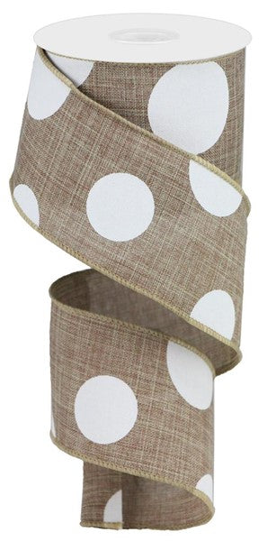 A 2.5 x 10 yd spool of beige/white ribbon with large multi dots (RX914301), unspooled in a loose spiral.