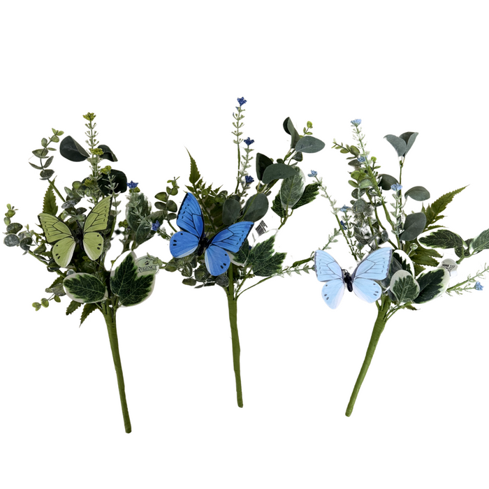 The 14 Assorted Papillion Garden Pick MTF24218 features three artificial leafy green stems, each adorned with a vibrant butterfly in yellow, blue, or light blue—perfect for brightening up any room.