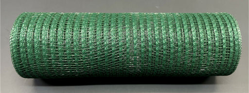 A 10X10Y Hunter Green Breeze Solid Mesh (XB240710-07) roll rests on a dark gray surface. The tightly wound cylindrical roll shows a grid-like pattern on its solid mesh.