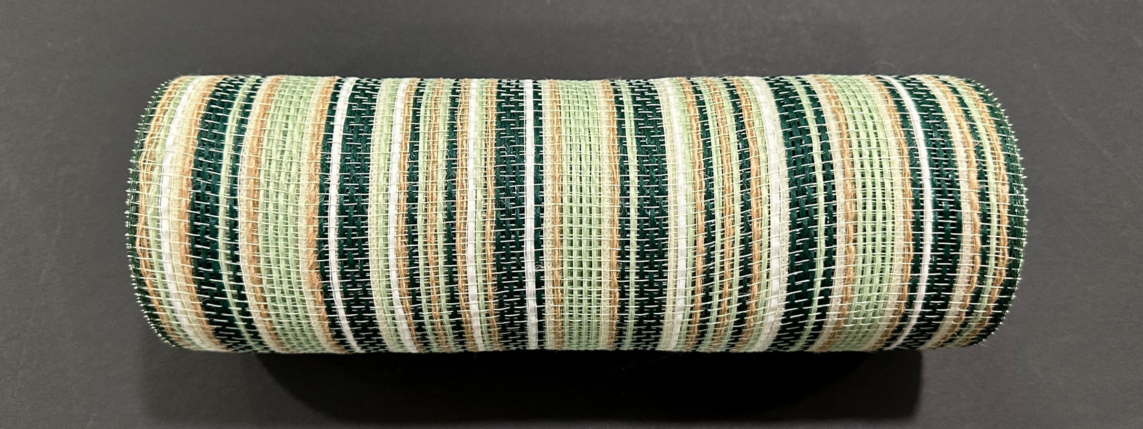 The 10X10Y Moss-Sage-Mint Varied Stripe Mesh (XB254210-08), a cylindrical roll with alternating moss sage mint, tan, and off-white stripes, is displayed on a black surface.