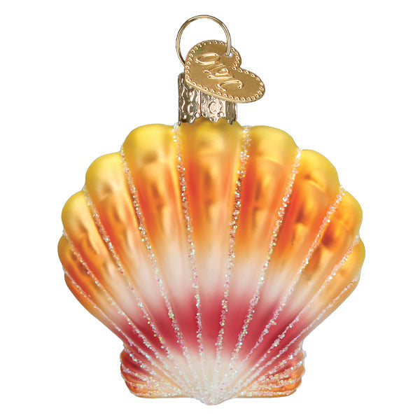 The Sunrise Shell Ornament by Old World Christmas (12651) features yellow, orange, and red scallop shell design with white glitter and a gold cap topped with a heart charm—perfect for celebrating new beginnings.