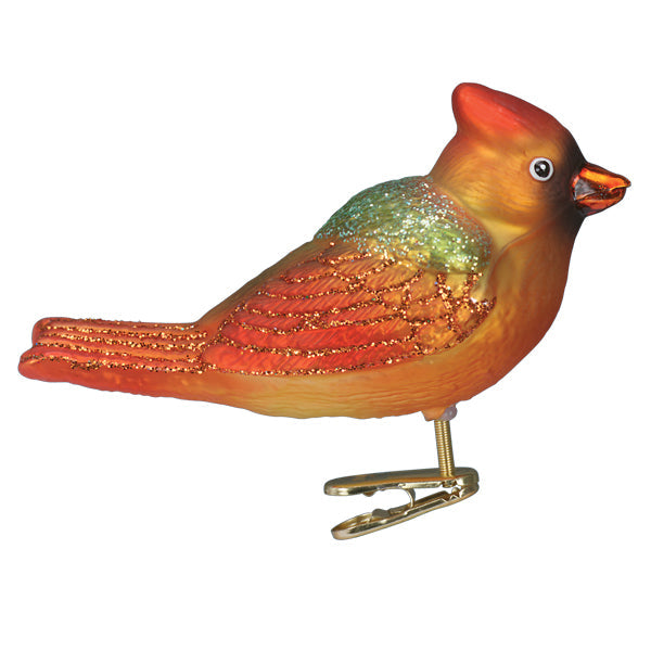The Gentle Cardinal Ornament by Old World Christmas (18140) features a red and orange glass bird with glittered back and a clip, adding charm to your Christmas tree decor.