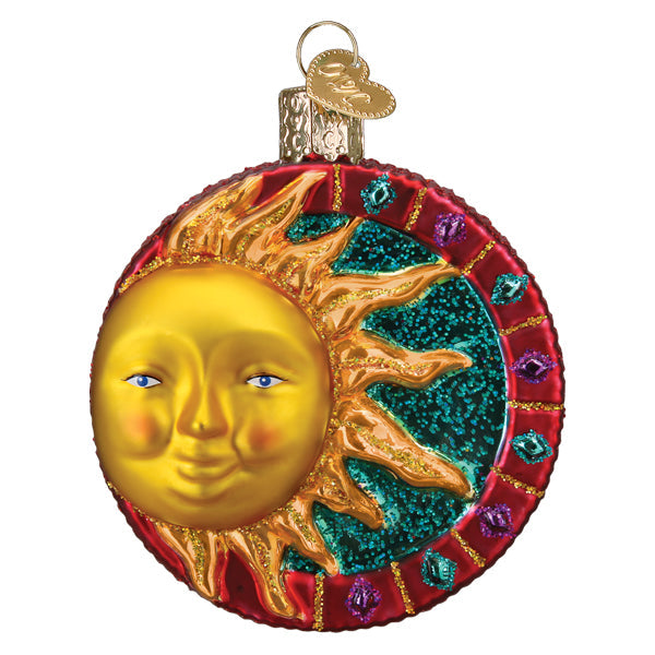 The Jeweled Sun Ornament by Old World Christmas (22042) features a golden sun face with jeweled rays on a glittery turquoise background and red jeweled border—perfect sun symbol decor to brighten any space.