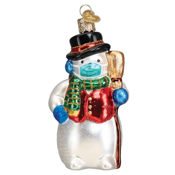 Add festive cheer with the Snowman With Face Mask Ornament by Old World Christmas (24209)—a glass snowman in a top hat, red vest, green scarf, blue gloves, blue mask, and holding a brown broom—perfect for your holiday tree.