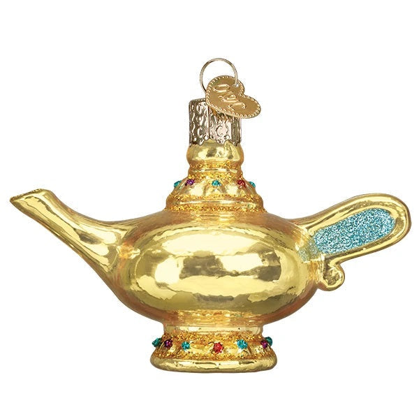 The Magic Lamp Old World Christmas Ornament 32422 features a shiny gold finish, blue glitter accents, colorful jewels, and a loop with cap for easy hanging.