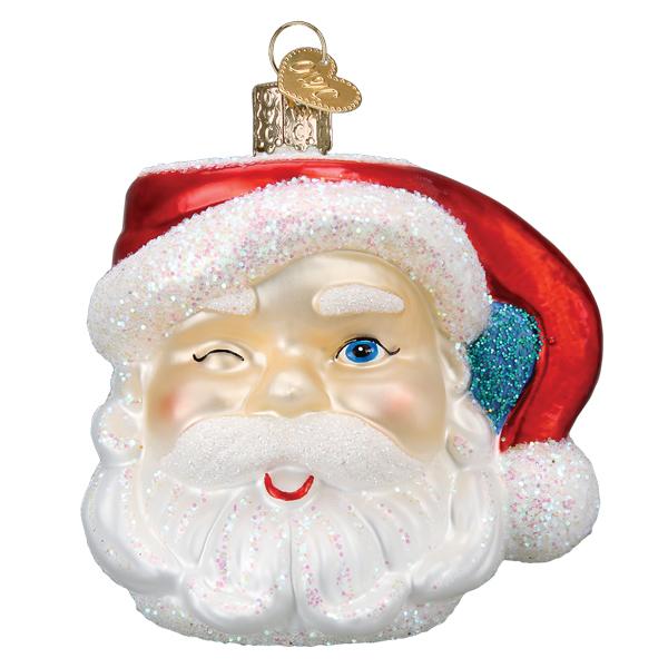The Santa Mug Ornament (Old World Christmas Ornament 32452) is shaped like Santa’s winking face, with a red glittery hat, white glittered beard, and a gold cap for hanging.