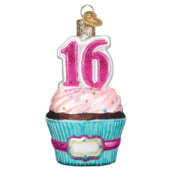 Celebrate a Sweet 16 with the Old World Christmas Ornament 32460—a cupcake design with pink frosting, colorful sprinkles, a glittery pink "16" candle, blue wrapper, and gold hanging loop for a special birthday keepsake.