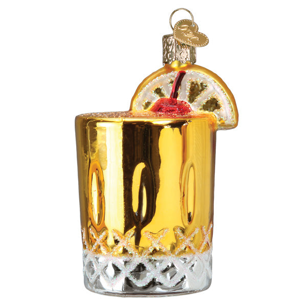 The Whiskey Sour Ornament by Old World Christmas (32514) features a gold and clear cocktail glass design, topped with a faux lemon slice and cherry—complete with a gold cap and loop for whiskey sour lovers.