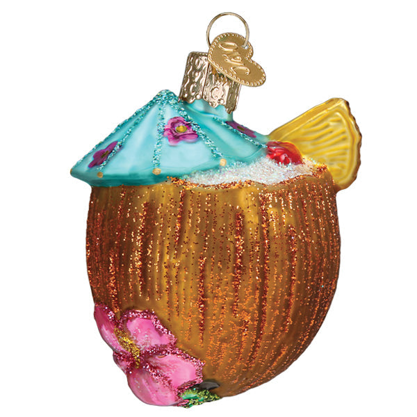 The Tropical Coconut Drink Ornament by Old World Christmas (32551) features a blue umbrella, yellow citrus wedge, pink flower, glittery accents, and a gold cap—perfect as a festive beach-themed decoration.
