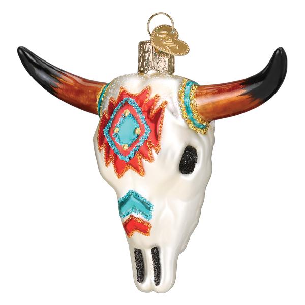 The Southwestern Steer Skull Ornament (Old World Christmas Ornament 36290) features a bull skull with bright Southwestern patterns, brown horns, turquoise details, and a gold hanging loop—a unique addition to your Christmas tree.