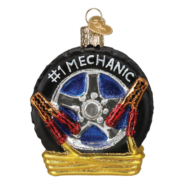 The Auto Mechanic Ornament by Old World Christmas (36311) features a tire with a metallic blue rim, jumper cables, and "#1 MECHANIC" text, topped with a gold hanging loop—an ideal unique gift for any mechanic.