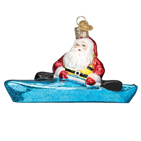 The Santa in a Kayak Old World Christmas Ornament 40316 shows Santa in a red suit paddling a blue kayak. This mouth-blown glass ornament features a gold hanging loop for display.