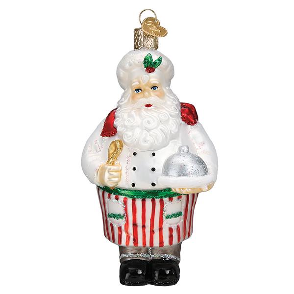 Add festive charm to your kitchen with the Chef Santa Ornament Old World Christmas Ornament 40320, featuring Santa as a chef holding a wooden spoon and silver platter, complete with a red and white striped apron—perfect holiday décor!.