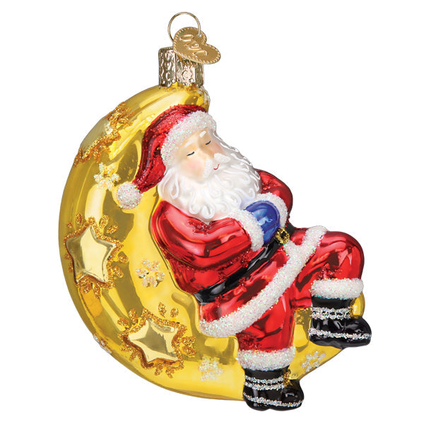 This delightful Moonlight Santa Ornament from Old World Christmas (Product Code: 40332) showcases a Santa figure comfortably nestled on a moonlit crescent. Dressed in his iconic red suit with white trim and black boots, Santa is enveloped by glistening stars, perfectly embodying the enchanting charm of Moonlight Santa in peaceful rest.