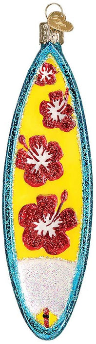 Introducing the Surfboard Old World Christmas Ornament 46061: a hand-blown glass masterpiece crafted in the shape of a surfboard. This exquisite ornament is adorned with blue glitter edges and beautifully showcases three red hibiscus flowers set against a vibrant yellow background. Finished with a golden cap for easy hanging, it promises to be an outstanding addition to any collection or Old World Christmas gift box.