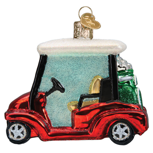 The Golf Cart Ornament (Old World Christmas 46108) features shiny red and white colors, gold seats, glittery accents, a hanging loop, and golf clubs at the back—an ideal unique gift for golf lovers.