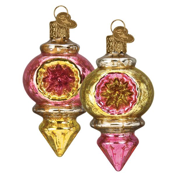 The Bright Candlelight Reflection Old World Christmas Ornament 51503 features two hand-painted glass ornaments in gold and pink with starburst patterns, gold tops, and hanging loops, capturing classic Old World holiday charm.