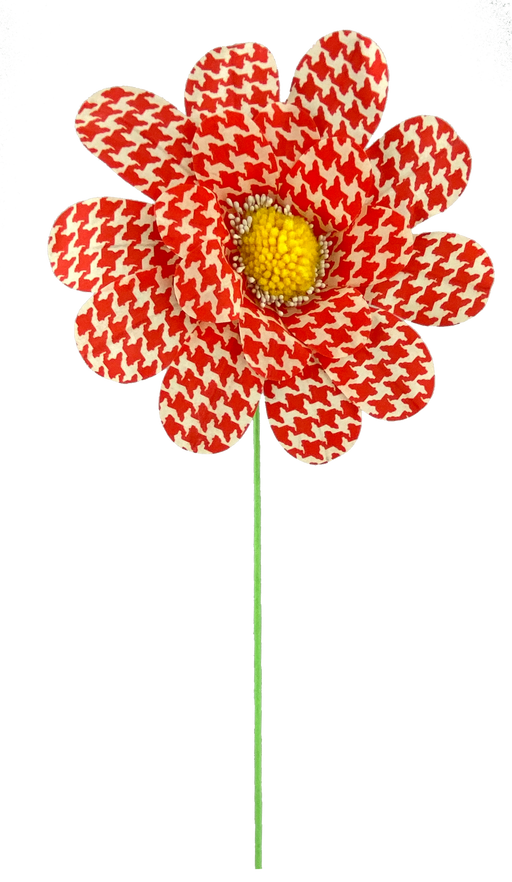 The 24 by 8 Orange Houndstooth Sunflower Spray features striking fabric petals with an orange houndstooth pattern and a vibrant yellow textured center, perched on a thin green stem against a black background.