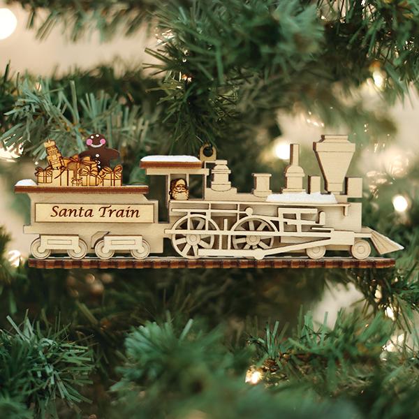 The Santa Train Old World Christmas Ornament 80008 is a wooden ornament shaped like a vintage train, decorated with gifts and a gingerbread cookie—perfect for adding Old World Christmas charm to your tree.