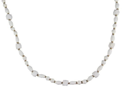 The 39"L Geometric/Barrel Wood Bead Garland in whitewash features irregularly shaped whitewashed wooden beads with small spacers, shown on a plain white background.