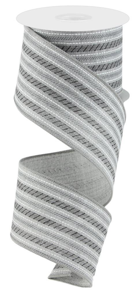 A 2.5X10Yd Slash Stripe/Royal Burlap Ribbon, in black, grey, white, and light grey (RGC195210), sits elegantly twisted on a white cardboard roll. This wired ribbon with a diagonal pattern is perfect for adding an elegant touch to your projects.