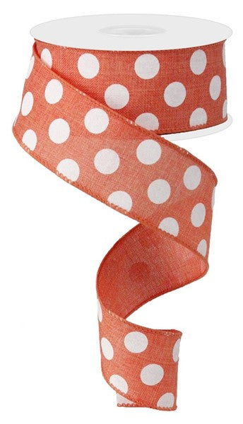 A spool of 1.5 x 10yd coral ribbon with medium white polka dots spirals downwards (RX914576).