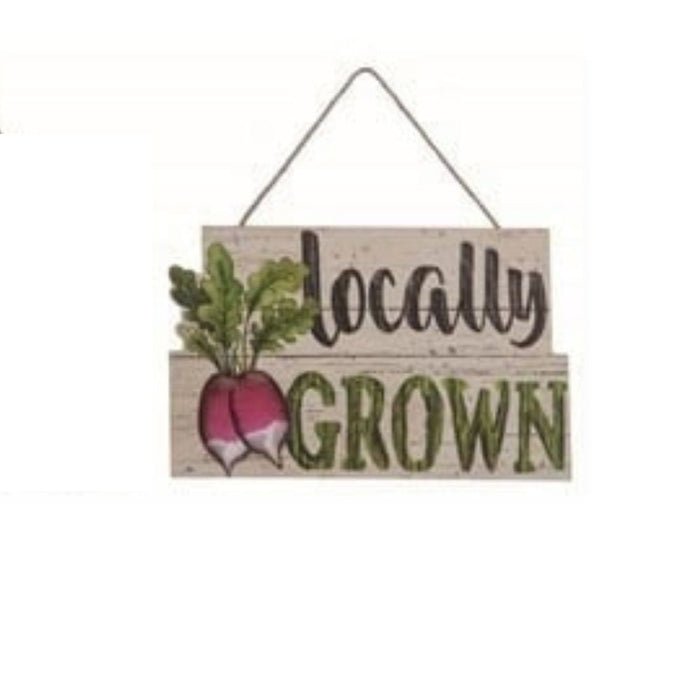 The Wood Vegetable Wall Decor Assorted A1666 features a farmhouse sign with two radishes and "locally GROWN" in black and green, hanging by a string—perfect for kitchen decor or vegetable-themed wall art.