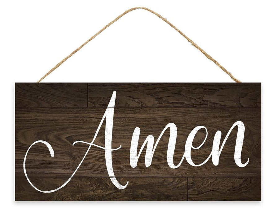 The 12.5L x 6H Amen Sign (AP7114) features Amen in elegant white script on an MDF wooden plaque, hanging by rustic rope against a dark wood background to add grace to any space.