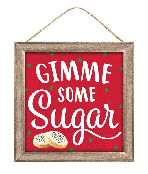 The 10Sq MDF Gimme Some Sugar Sign (AP7168) features a red background with green dots, white GIMME SOME Sugar text, and two decorated sugar cookies at the bottom left. Hangs on a string. Colors: red/white/emerald/light brown.