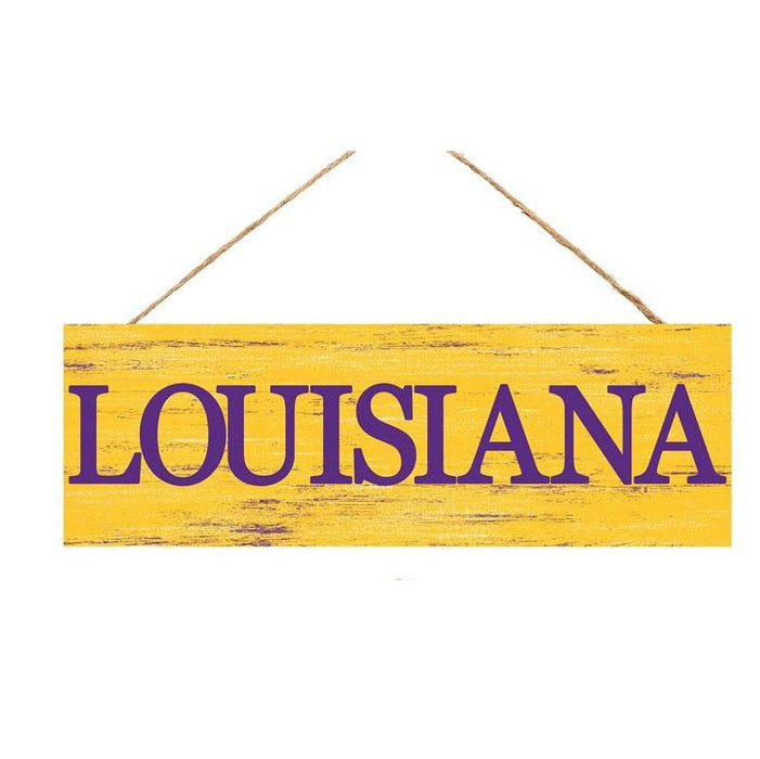 The Purple Yellow Louisiana or Go Team Assorted Wall Hanging AP807899 is a rectangular MDF sign with a distressed yellow finish and rope hanger, prominently featuring LOUISIANA in bold purple letters.