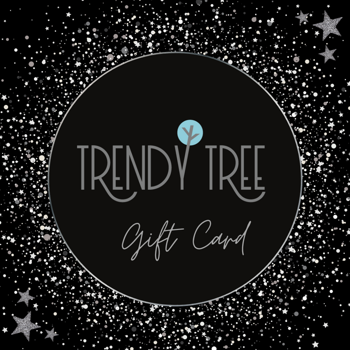 The circular Trendy Tree Gift Card design has a black background with white stars and dots. Trendy Tree is in light gray with a tree symbol above the I and Gift Card elegantly written below in cursive, ready for redemption.