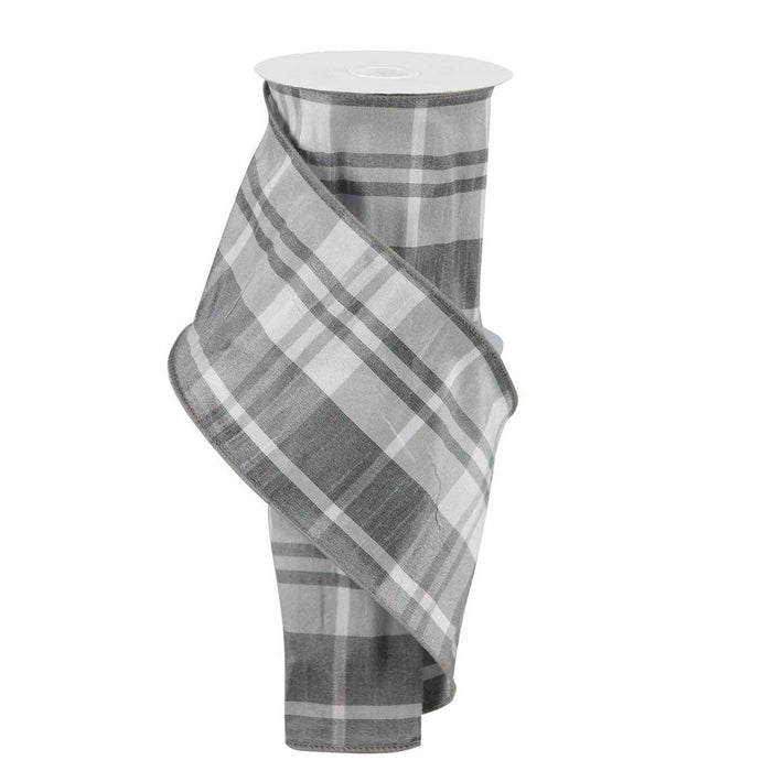 The 4 Grey White Check Faux Dupioni Ribbon RGA123510 boasts a vertically draped section of gray and white plaid fabric. Its classic checkered pattern on a white background is elegantly enhanced by a subtle wire edge for added structure and style.