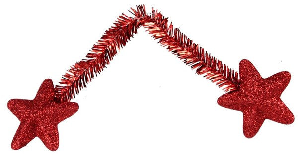 The 6 Red Star Pencil Tie (Bag of 12, XX761624) features two glittered stars on each end of a sparkly, flexible red tinsel strand, arranged in a zigzag shape on a white background.