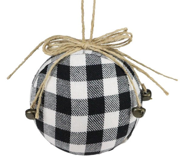 The 4.75" Black White Fabric Buffalo Check Ball Ornament XY936233 features a stylish black and white plaid fabric, a twine bow, and mini metal bells, making it a charming festive accent for your holiday décor.