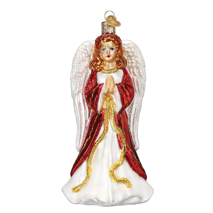 Divinity Angel Old World Christmas Ornament 10228 features a hand-painted glass angel with white wings, a red and white gold-trimmed gown, and praying hands, inspired by the Old World Christmas style. Set against a plain white background.