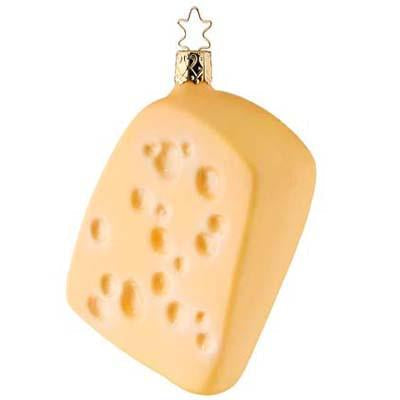 The Swiss Cheese Christmas Ornament Inge-Glas of Germany 1-116-09 is a whimsical cheese wedge ornament with a gold cap and star-shaped loop—perfect for adding a fun German touch to your holiday tree.