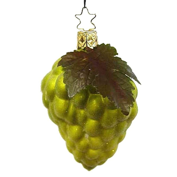 The Green Frosted Grapes Christmas Ornament by Inge-Glas of Germany (123608) is a mouth-blown glass piece featuring a realistic grape cluster, two green leaves, and a gold cap with star-shaped hook.