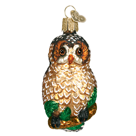 The Spotted Owl Old World Christmas Ornament 16052 showcases a glass owl adorned with intricate brown and white feathers, delicately perched on a branch with green leaves. Featuring detailed eyes and a small metal loop for hanging, it subtly raises environmental awareness about endangered species.