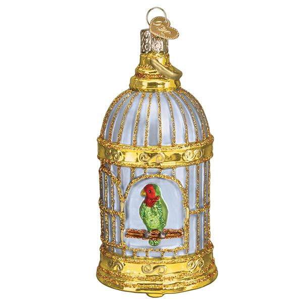 The Vintage Bird Cage 16127 Old World Christmas Ornament is a hand-painted glass piece with glitter, featuring a gold and silver cage, a green and red bird inside, and a hanging loop on top.