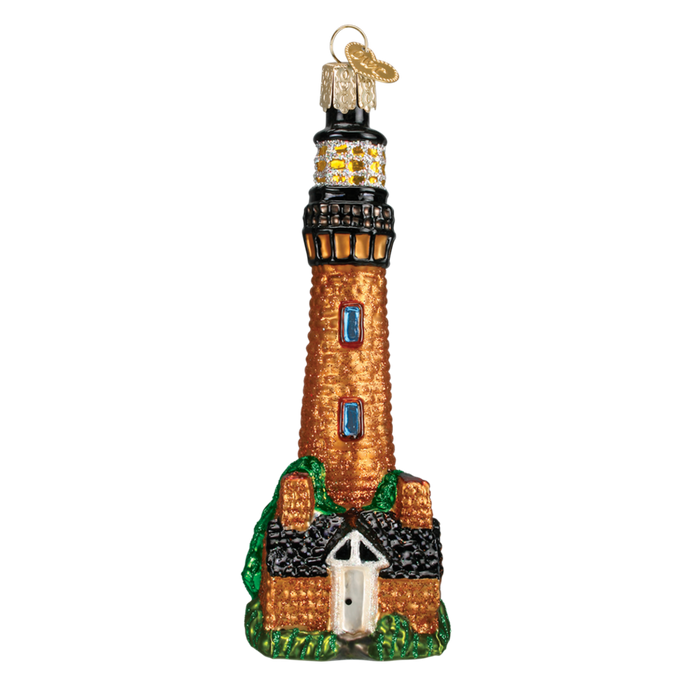 The Currituck Lighthouse 20051 Old World Christmas Ornament is a hand-painted glass ornament featuring a brick-patterned tower, black and gold top, blue windows, green accents, a house at the base, and a gold hanging loop—ideal for Christmas.
