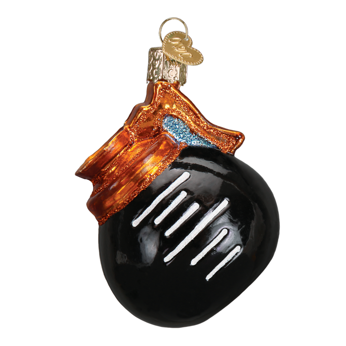 A hand-painted glass Christmas ornament shaped like a coffee pot with a gold cap and loop for hanging from Old World Christmas.